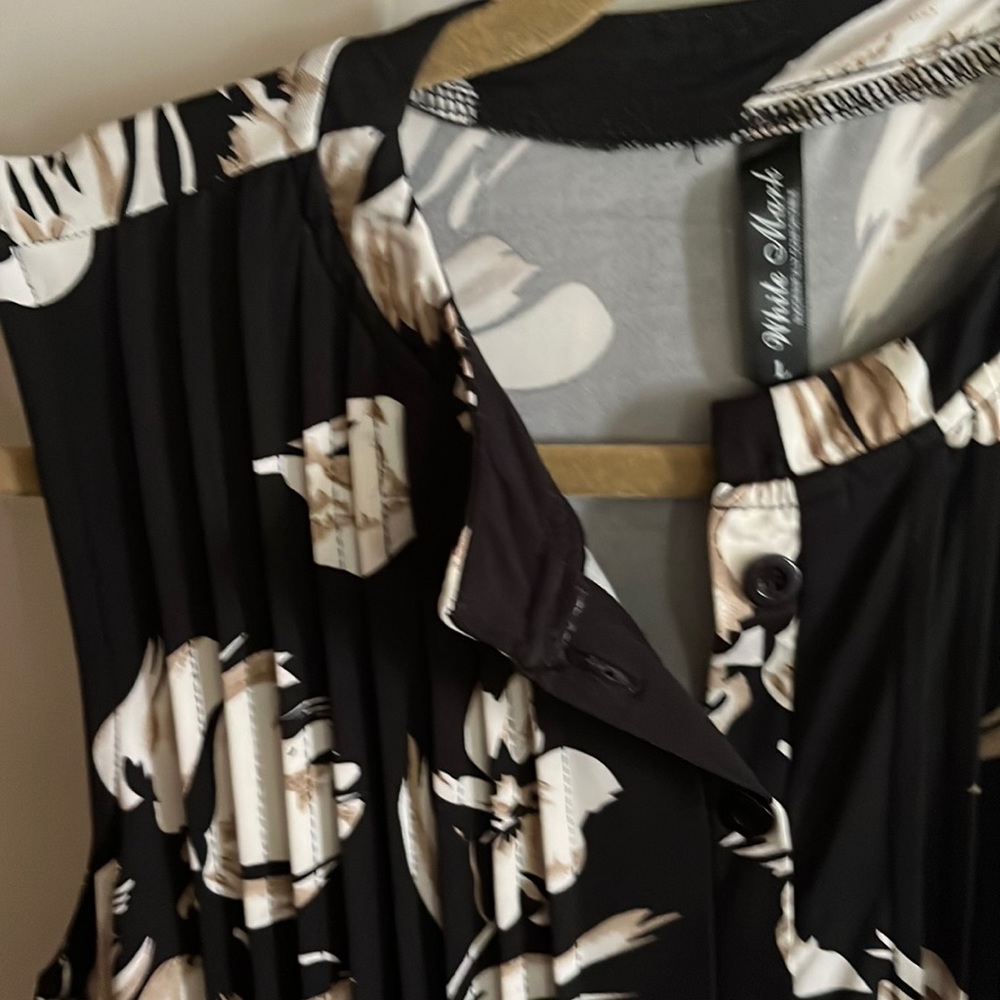 Long Sleeveless top. Size large. Would go well Leggings